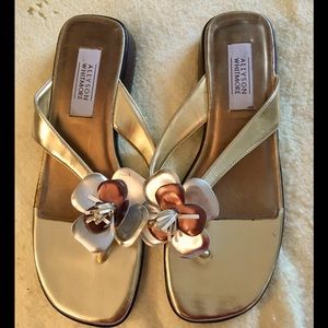NWT Gold metallic slip on sandals with 1 inch heel. Multi Flower appliqué